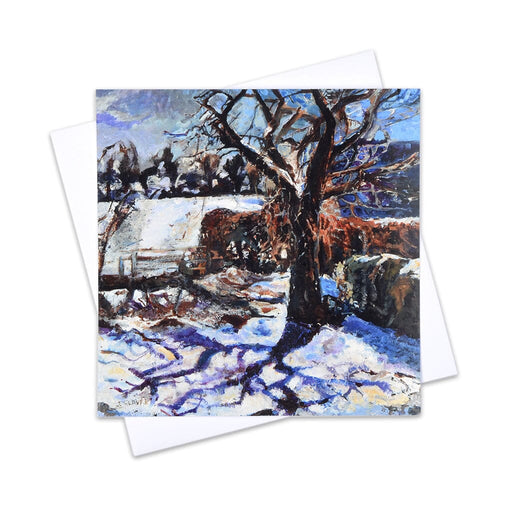 A Snow scene Christmas card with a tree and snow-covered ground printed on 300gsm FSC certified board making a high quality artistic Christmas card