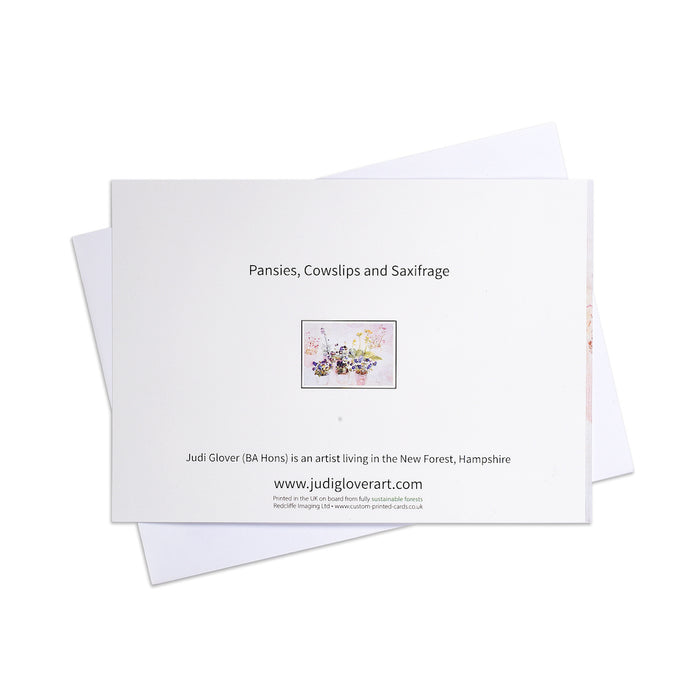 A watercolour flower greeting card of pansies, cowslips and saxifrage in flowerpots. A blank card for your own message this is an ideal birthday card for Mum  or for any occasion.