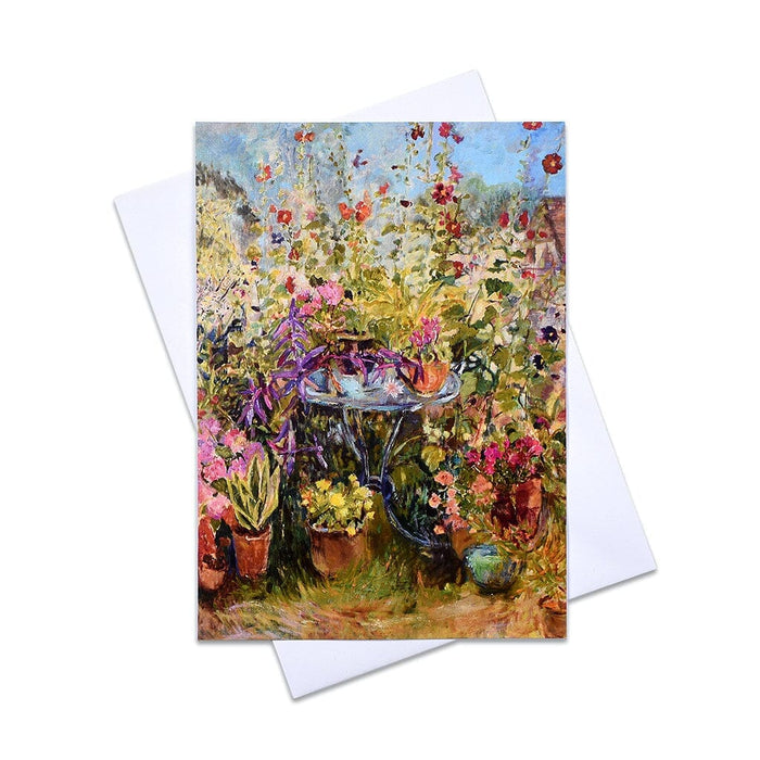 An artistic greeting card of a profusion of plants and flowers in a summer garden. This beautiful card is blank inside for your own message