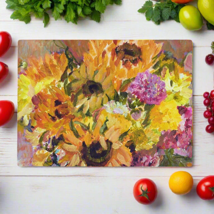A sunflowers glass chopping board made from toughened glass and versatile as a chopping board, food platter. A perfect gift for mum