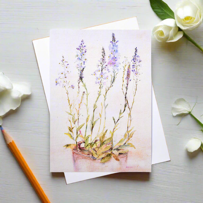 This wildflower greeting card is a floral card made from a watercolour painting of a pretty garden variety of Speedwell with blue and violet petals.
