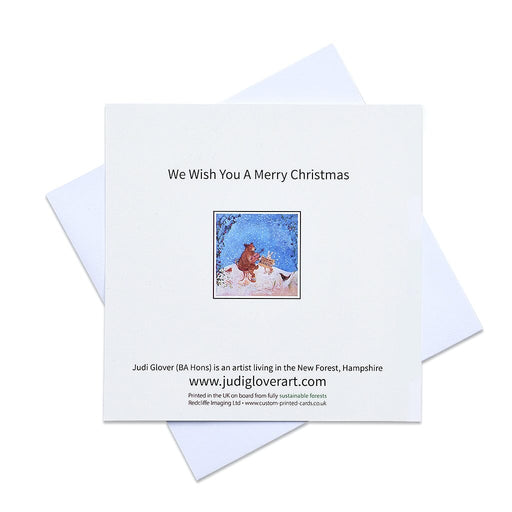 Merry Christmas cards by judi glover art. These cute christmas cards show a bear playing the fiddle with a rabbit and a robin in a snowy christmas scene. The christmas cards are sold in packs of 6