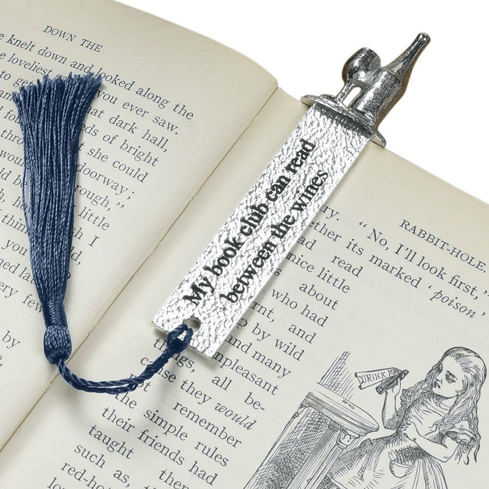 Book club gift by Judi Glover Art. The club bookmark is made from metal and is shown in a book