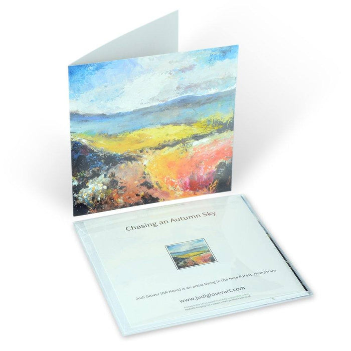 A fine art card showing the Autumn sky in the New Forest by Judi Glover Art. The cards are from a painting is called Chasing an Autumn Sky and is blank with envelopes 