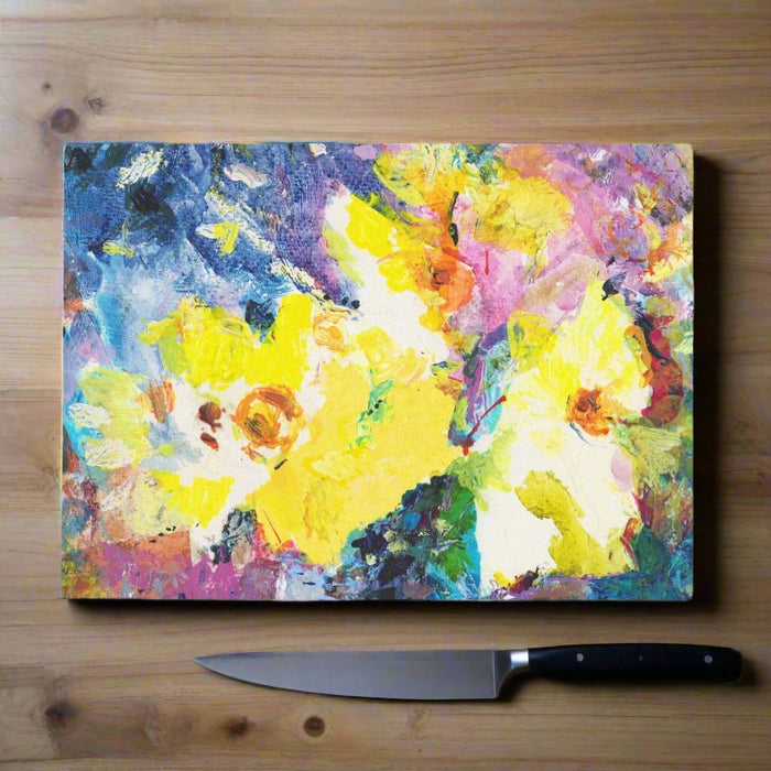 A beautiful and fun glass chopping board made from a flower painting by Judi Glover Art. The worktop saver is designed to be practical while adding decoration to worktops tabletops and kitchens making a great gift for the kitchen