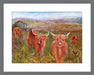 Highland cows print with a white border and dark grey frame at www.judigloverart.com. The Highland cow art shows cows in a field with long horns