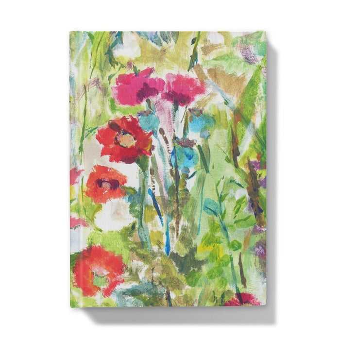 Back cover of the hardback notebook. The a5 notebook has poppies on the front and back cover. Each lined notebook or plain notebook has a poppy design on the cover