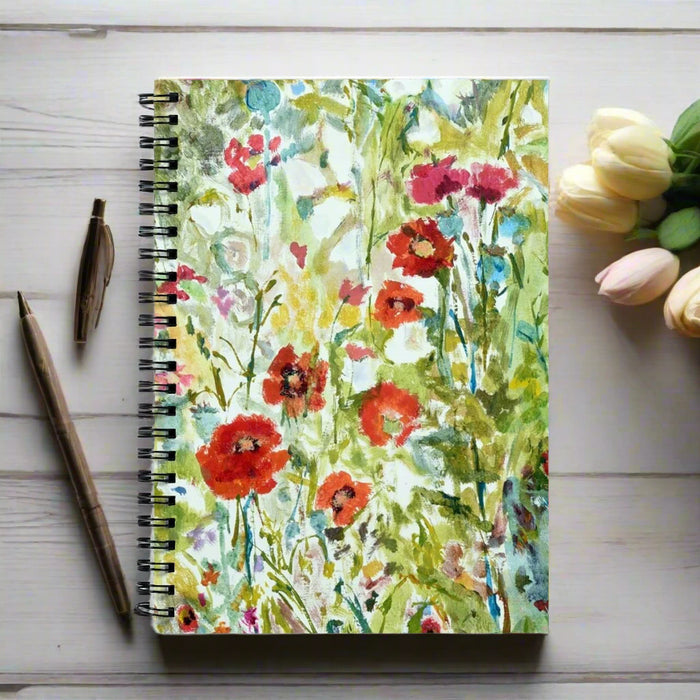 Spiral notebook from www.judigloverart.com. The A5 notebook has 120 pages with a choice of a lined notebook or graph notebook. The poppies notebook is made in the UK