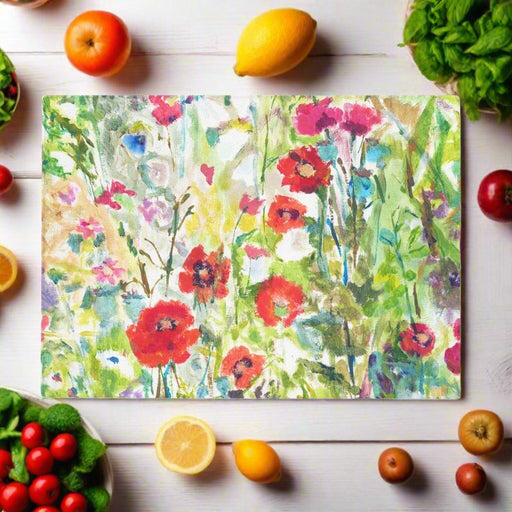 This glass chopping board with delightful red poppies will add colour and a decorative touch to worktops and the kitchen. The worktop saver can be bought as a housewarming present at www.judigloverart.com