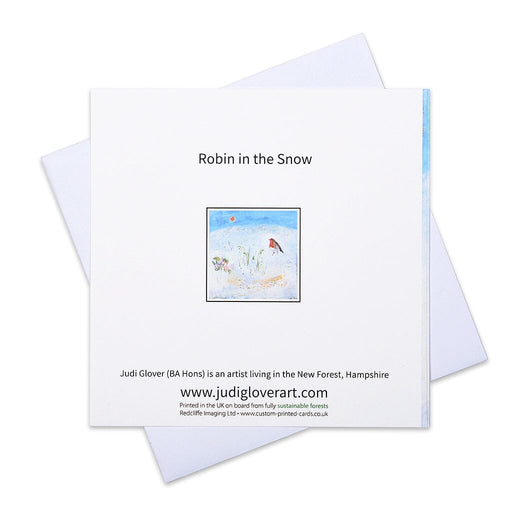 Robin Christmas cards from Judi Glover Art showing a robin in the snow amongst snowdrops. The luxury Christmas cards are made in the UK and are blank inside in packs of 6