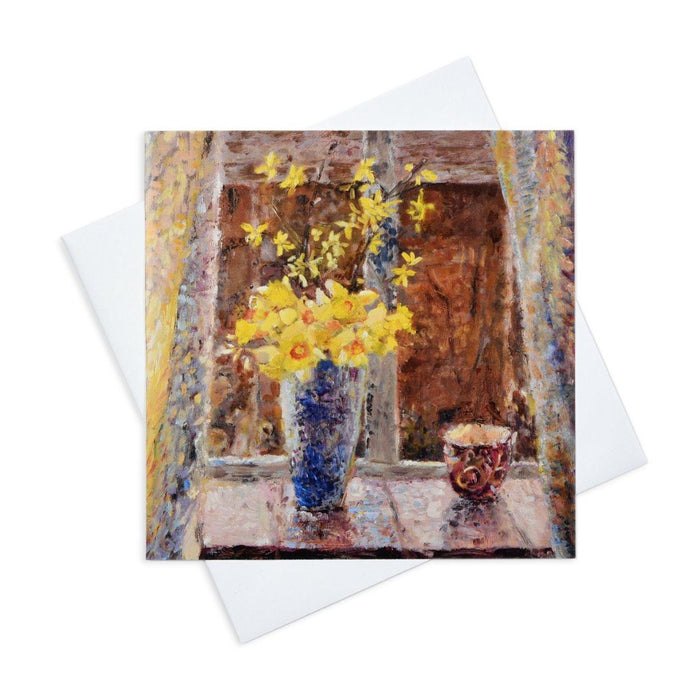 A daffodil greeting card of a vase of yellow daffodils sitting in a window. The pretty floral cards are available from Judi Glover Art