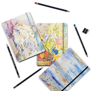 Artistic Notebooks made from floral paintings by Judi Glover Art. The arty notebooks are A5 in size and lined with ring binders