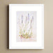 A botanical framed print of the pink wildflower Speedwell. The framed art  is mounted in a white wooden frame and making unique wall art for the bedroom