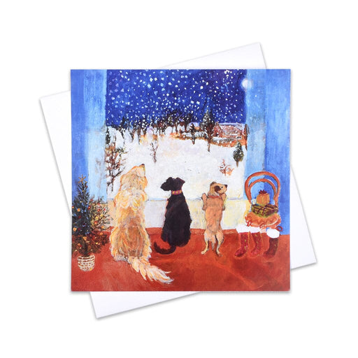 A dog Christmas card with a winter scene of dogs looking out a snowy window.