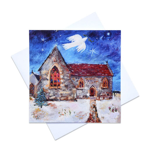 Dove Christmas cards by www.judigloverart.com showing a dove flying over a church and a Christmas tree. The dove of peace Christmas cards are made from a gouache painting. 