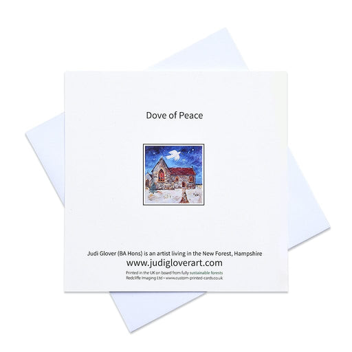 Dove christmas cards with a white dove flying over a village church in the night. The dove of peace christmas cards by judi glover art are in packs of 6 and made in the uK