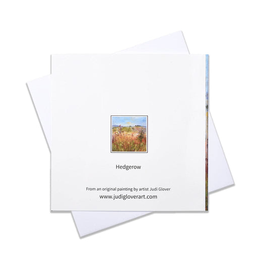 A landscape greeting card of a painting of fields and hedgerows. This birthday card online is a blank greeting card