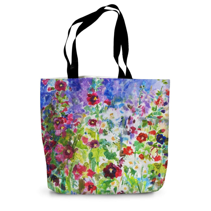 A canvas tote bag that makes a perfect summer holiday bag with a pretty floral print on sturdy cotton canvas