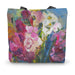 A colourful tote bag with a roses design and made from high quality canvas