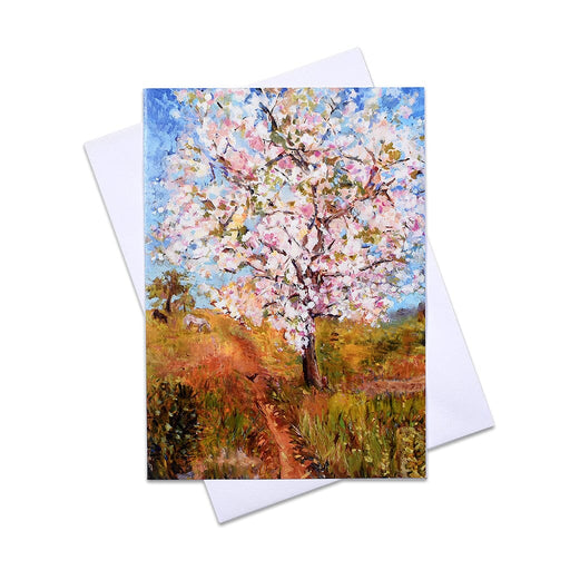 A unique greeting card made from a painting of a Spring Meadow. This pretty card shows a cherry tree in full blossom