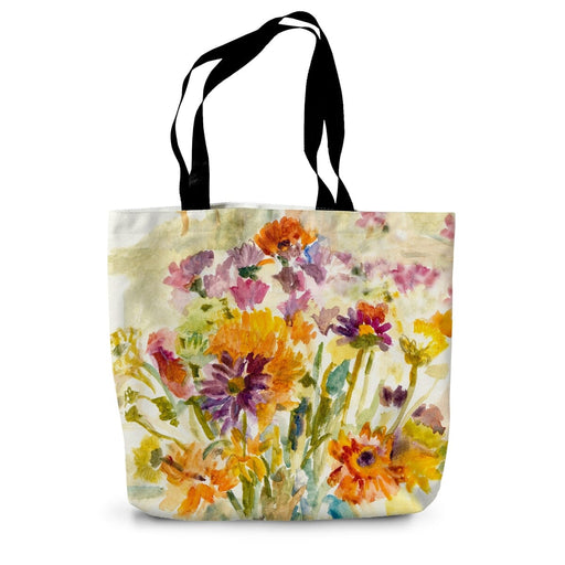 A summer tote bag with a printed flower design on the front and back