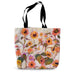 A canvas tote bag with a print of bright sunflowers on both sides