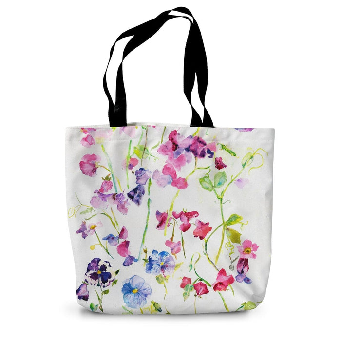 A shopping tote bag with a sweet peas print making a pretty canvas bag for many uses