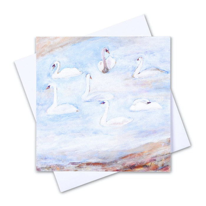 An artistic christmas card showing seven swans swimming in a lake. Available as part of a christmas card pack at judi glover art