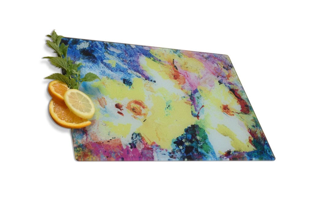 The glass chopping board by www.judigloverart.com with bright yellow flowers as the worktop saver surface. The bright yellow colours of flowers make a beautiful gift for the Kitchen
