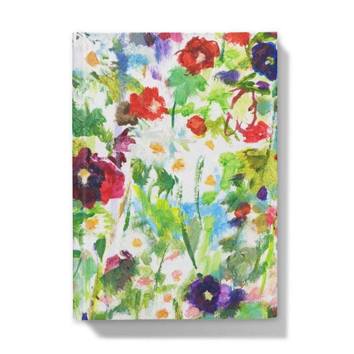 Front cover of a hardback notebook journal at www.judigloverart.com. The A5 notebook shows hollyhocks and daisies