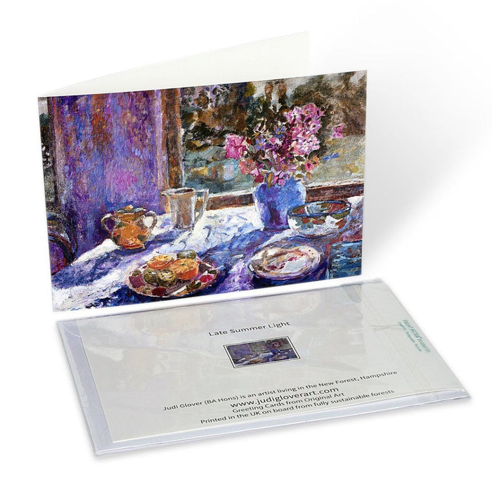 Original Art Greeting Card. A greeting card made from an original still life painting. The card shows flowers and objects on a table with late summer light shining through. Fine Art Greeting Card made from and original painting by Judi Glover. Available at Judi Glover Art. 