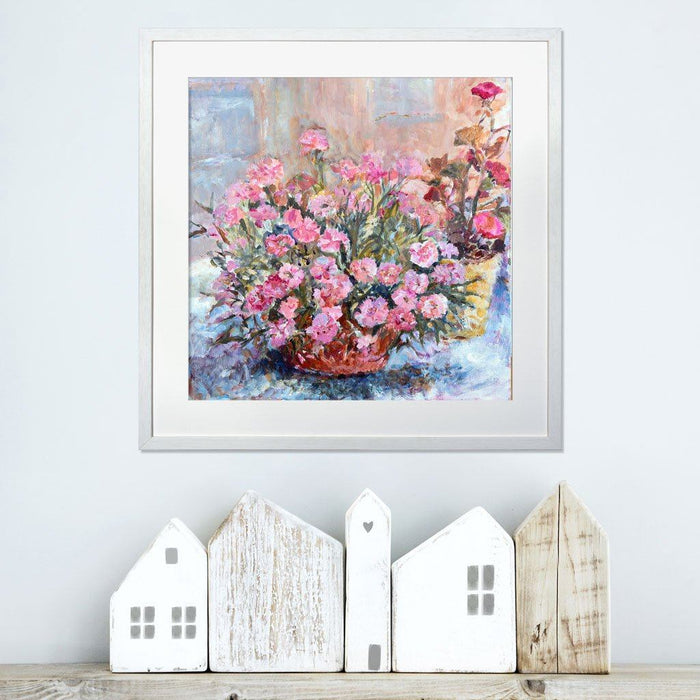 Print of flowers showing pink carnations in a pot next to a geranium. The floral art prints are available from Judi Glover Art
