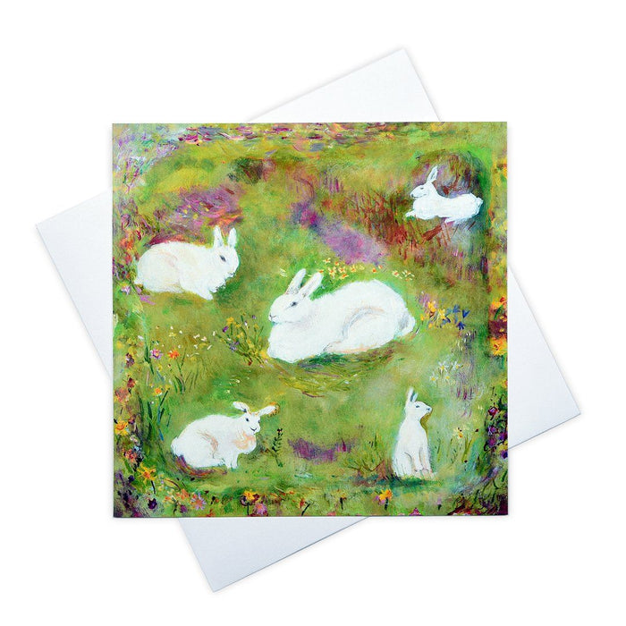 Blank greeting cards available at Judi Glover Art. Artistic cards have a Spring theme in a set of 6. The card shown is of white rabbits