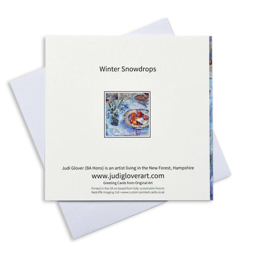Snowdrop Christmas cards from a painting of snowdrops and tangerines. Art Christmas cards in the UK from original artwork. The snowdrop Christmas cards are available online at Judi Glover Art.