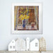 Daffodil Prints from a fine art painting by Judi Glover Art of Spring Daffodils in a vase next to a window. The Daffodil Wall Art Print is framed in white and hanging on a wall above a shelf with wooden houses