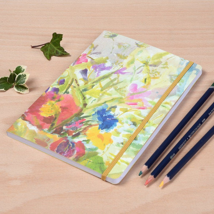 Arty Notebook available online at Judi Glover Art. The floral notebook features a cover of summer flowers. Each beautiful notebook is a A5 notebook with 120 pages of lined paper