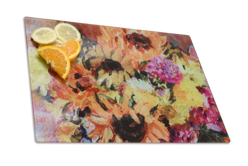 Worktop saver from www.judigloverart.com with pretty sunflowers. The glass chopping board makes a unique present for Mum