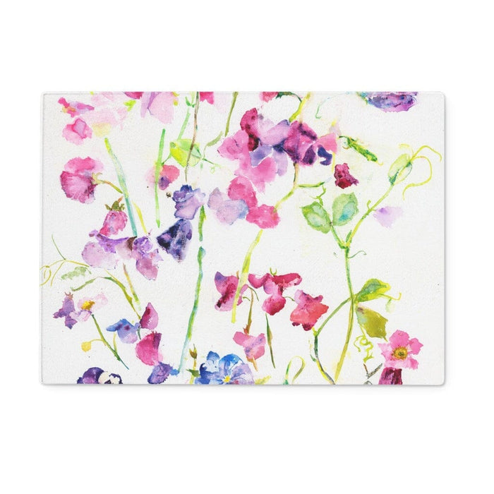 This pretty glass chopping board is hard wearing, versatile and made from a painting of sweet peas. The floral delicate pattern by Judi Glover Art makes a decorative worktop saver or kitchen gift