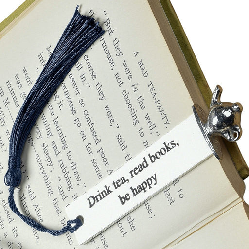 Tea lover gifts by Judi Glover Art. The tea lover metal bookmark is inscribed with drink tea, read books, be happy