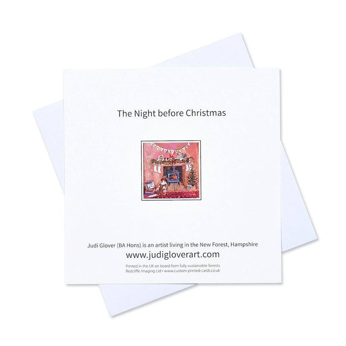 Christmas card packs available at Judi Glover Art made from an artistic painting of a night before Christmas. The dog Christmas cards show a dog beside a fireplace looking at treats and are in a pack of 6