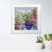 Flower art prints with two pink fuchsias with their fairly flowers. The fuchsia wall art is framed in a white frame and hanging on a wall and available at Judi Glover Art